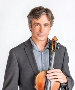 Photo of Steven King with viola